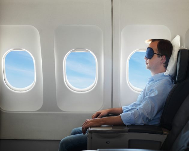 Portrait of man relaxing in the airplane