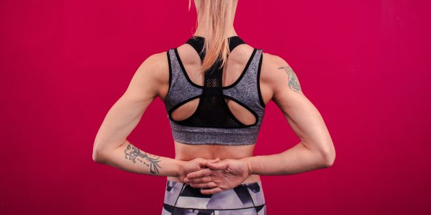 posture correction: hands on the lower back