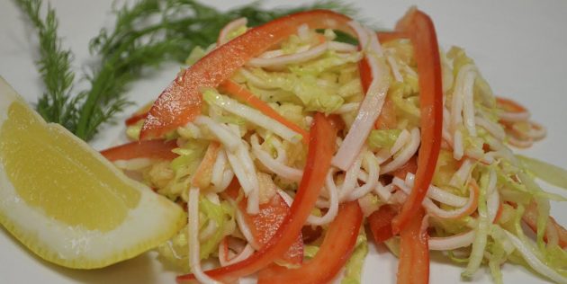 Salad recipe with crab sticks, cabbage, pepper and apple