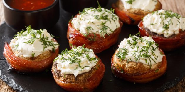 Stuffed champignons in bacon: simple recipes