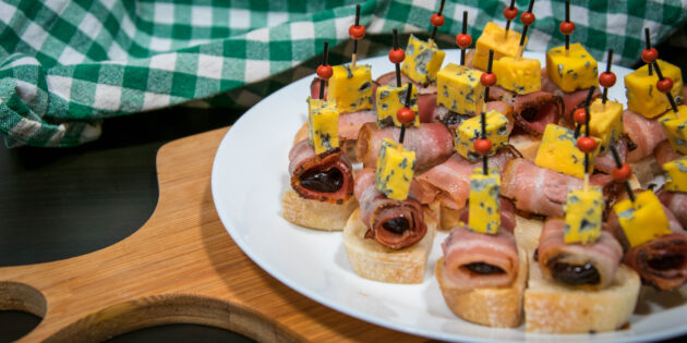 Canape with prunes and bacon