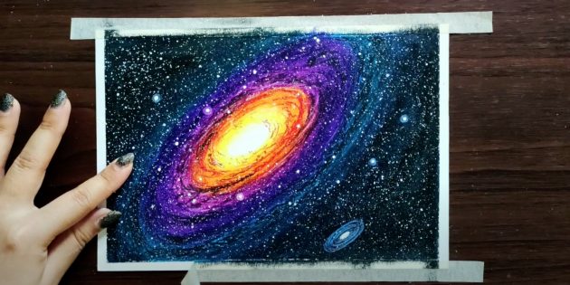 How to draw space with pastels: draw an oval and circles
