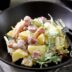 Салат с маринованными опятами, картофелем, ветчиной и капустой