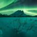 Фотограф снял чрезвычайно редкие завитки северного сияния