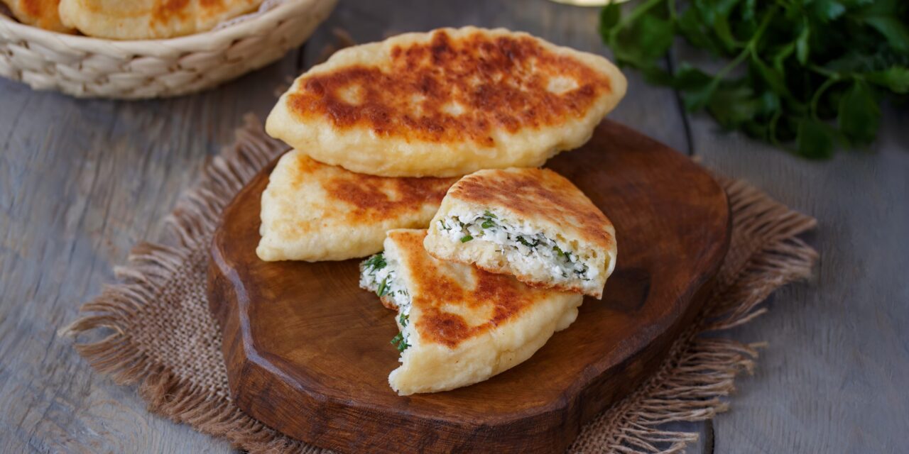 Fried kefir pies with cottage cheese and herbs