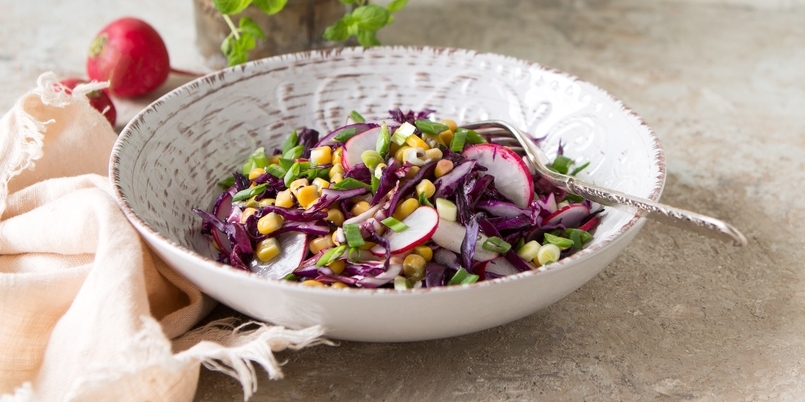 Salad with cabbage, corn and radishes